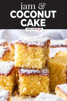 jam and coconut cake is stacked on top of each other with powdered sugar in the middle