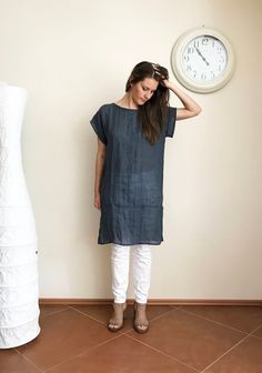 "Rustic but soft and gauzy linen coverup tunic. Excellent for layering and as a stylish cover. Lightweight with shirt sleeves and cute slits on the sides. Made from 100% pure linen in dark blue/grey color. This shirt is airy and see-through but at the same time has that rustic quality. An eco-friendly choice. The cut is loose and comfortable. The top will be custom made for you within 10 days with great attention to finishing. You will receive the top already softened. It won't shrink anymore. E Blue Grey Color, Plus Size Beach, Linen Tunic Tops, Coverup Beach, Dark Blue Grey, Top Plus Size, Linen Tunic, Plus Size Top, Linen Top