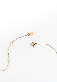 This shiny gold must-have necklace features a dainty chain adorned with chic 14K plated gold diamond-shaped pendants. Wear the All is Bright Necklace alone or layer it up for a touch of effortless shine to any outfit! Your purchase of the All is Bright Necklace to wear or to gift, gives survivors of human trafficking and exploitation the opportunity to build a bright sustainable life of freedom! Thank you! Box size and color may vary. Materials: 14k gold plated stainless steel necklace Hypoaller Delicate 14k Gold-filled Layered Necklace As Gift, Spiritual Yellow Gold Opal Necklace, Delicate 14k Gold-filled Tarnish Resistant Chain Necklace, Delicate Hypoallergenic 14k Gold-filled Necklace, Hypoallergenic 14k Gold-filled Necklace, Bright Necklace, All Is Bright, Dainty Chain, Steel Necklace