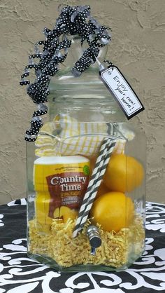 a glass jar filled with lemons and other items