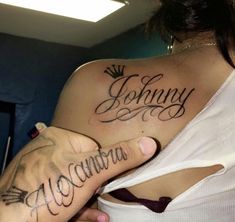 a woman with tattoos on her shoulder and arm that says, johnny montana in cursive writing