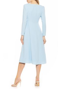 A lace-and-ribbon-trimmed neckline sweetens this perfectly flared midi. 48" length (size 2) Hidden back-zip closure Scoop neck Long sleeves Partially lined 97% polyester, 3% spandex Machine wash, line dry Imported Spring Fit And Flare Midi Dress With Back Zipper, Spring Cocktail Midi Dress With Back Zipper, Feminine Blue A-line Midi Dress, Spring A-line Midi Dress With Back Zipper, Elegant Light Blue Square Neck Dress, Solid Color Spring Dress With Back Zipper, Formal Light Blue A-line Midi Dress, Spring Evening Midi Dress With Back Zipper, Light Blue Knee-length Midi Dress For Daywear