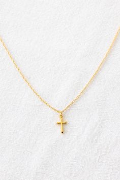 14k gold filled dainty rope chain necklace with a 14k gold filled 8mm x 12mm cross pendant Length: 18" Dainty Adjustable Cross Jewelry, 14k Gold Clavicle Chain Necklace With Cross Pendant, 14k Gold Clavicle Chain With Cross Pendant, Everyday Gold Plated Cross Pendant Necklace, Minimalist Jewelry With Cross Pendant Clavicle Chain, Minimalist Clavicle Chain Jewelry With Cross Pendant, Minimalist Cross Pendant Necklace With Adjustable Chain, Gold Plated Delicate Chain Necklace With Cross Pendant, 14k Gold Cross Pendant Jewelry For Everyday