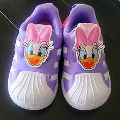 Toddler Daisy Duck Adidas Sneakers. Purple/Pink/White Size 5 Never Worn Playful Slip-on Sneakers With Soft Sole, Cute Sports Sneakers With Round Toe, Cute Round Toe Sports Sneakers, Pink Sneakers With Rubber Sole, Playful Non-slip Closed Toe Sneakers, Pink Closed Toe Sneakers With Rubber Sole, Pink Synthetic Closed Toe Sneakers, Pink Closed Toe Synthetic Sneakers, Pink Synthetic Closed-toe Sneakers