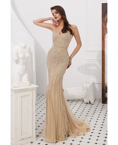 Buy Mermaid Champagne Beaded Stripe Party Dress With Spaghetti Straps at affordable price online. Free shipping and pro custom service since 2009. Embellished Spaghetti Strap Dresses For Banquets, Fitted Spaghetti Strap Evening Dress For Banquet, Gold Embellished Dress With Spaghetti Straps, Sequin Spaghetti Strap Dress For Banquet, Gold Fitted Dress With Beaded Straps, Embellished Gown With Fitted Bodice And Spaghetti Straps, Fitted Sequin Gown With Spaghetti Straps, Fitted Embellished Evening Dress With Spaghetti Straps, Fitted Evening Dress With Beaded Spaghetti Straps