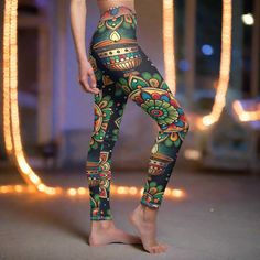 Celebrate in style with our Festival Of Lights Leggings! Perfect for a Diwali outfit, these Indian celebration leggings make a great Diwali gift. Embrace clothing for Diwali and honor good over evil celebrations. - Items are specially MADE TO ORDER. Please allow enough time for both production and shipping or your items.  - 95% Polyester brushed suede 5% Spandex - Skinny fit - Tagless - White thread color - Runs true to size - NB! Black color prints may appear in a greyish tone - Assembled in th Traditional Festive Multicolor Bottoms, Traditional Multicolor Festive Bottoms, Festive Traditional Multicolor Bottoms, Fitted Pants For Navratri Festive, Festival Ankle-length Pants, Festive Ankle-length Bottoms For Festivals, Festive Green Pants For Festivals, Green Pants For Festive Occasions, Ankle-length Pants For Festivals