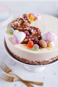 a white cake topped with lots of candies