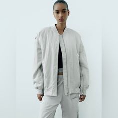 Love This Look! The Color Is A Gorgeous Light Gray, Almost Silvery Hue. Oversized & Extremely Comfortable! Water Repellent , Round Neck & Long Sleeves. Zipper Details , Love The Zippers On The Sleeves. Looks Super Cute With Jeans Or Leggings. Perfect For Everyday On The Go! Bomber Jacket Oversized Boyfriend Zip Front Water Repellent Zara Casual Outerwear With Ribbed Cuffs, Oversized Spring Windbreaker, Oversized Windbreaker For Spring Workwear, Oversized Sporty Spring Windbreaker, Sporty Oversized Windbreaker For Spring, Spring Urban Track Jacket With Ribbed Cuffs, Urban Outerwear With Ribbed Cuffs For Spring, Urban Spring Windbreaker For Workwear, Urban Style Spring Windbreaker For Workwear