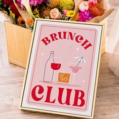 a sign that says brunch club next to some flowers