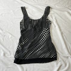 2000s sleeveless tank top in black and white polka dot pattern. In good condition. Note: I try to match colors as much as possible to pictures but there is a possibility it won't be an exact match. Unless the color is completely incorrect I am unable to offer refunds for this reason. Size: not labeled, fits like a small Brand is Maurices Measurements (taken on garment laid flat): Armpit to armpit: 15.5" Waist: 29" Armpit to hem: 18" Fabric: not labeled Fitted Polka Dot Tank Top, Polka Dot Sleeveless Tank Top, Fitted Polka Dot Casual Tank Top, Fitted Polka Dot Sleeveless Top, Fitted Polka Dot Sleeveless Blouse, Y2k Black And White, Match Colors, Y2k Black, Polka Dot Pattern