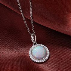 SKU#:JU105NL Gem Information Gem Type:Opal Stone Shape:Round Cut Stone Size: 10 mm Necklace Information Metal: 925 Sterling Silver Plating Color:Silver Chain Length: 45+5 cm Extended Width:14.5 cm *All stone weights (CT.) are approximate and listed as diamond equivalent weight in carats. Also total weight may have a slight deviation no more than 5%. *Photos may be enlarged to show beauty of details. *Free gift packaging for any order! Opal Gemstone Round Pendant Necklace, White Gold Opal Round Necklace, Elegant Round Opal Necklace, Sterling Silver Round Necklaces With Stones, Sterling Silver Necklace With Gemstone Accents, Sterling Silver Round Necklace With Gemstone Accents, Opal Birthstone Necklaces, Opal Birthstone Round Necklaces, Round Opal Birthstone Necklaces