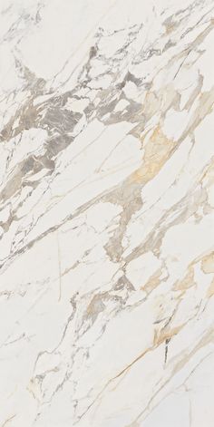 a white and gold marble textured wallpaper or flooring with an abstract design