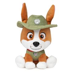 a small stuffed dog wearing a green hat