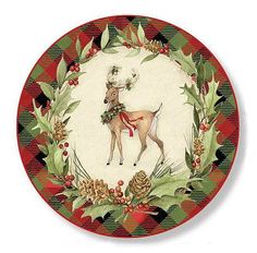 a plate with a deer and holly wreath on it