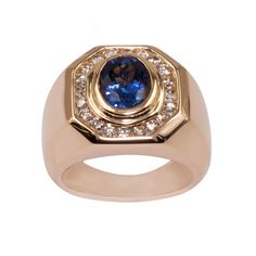 1.80 Carat Oval Tanzanite Ring in 14K Yellow Gold .