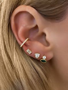 Featuring a stunning combination of sparkling CZ diamonds and vibrant emerald stones. Add a pop of color to any outfit with these elegant studs.Stone: Cubic Zirconia & EmeraldSize: 8mm tall, 7mm wide.Materials: Sterling Silver & 14K Gold Vermeil Gold Bond, Vermeil Jewelry, Demi Fine Jewelry, Emerald Earrings, Jewelry Stand, Diamond Drops, Stunning Earrings, Cz Diamond, Fine Earrings