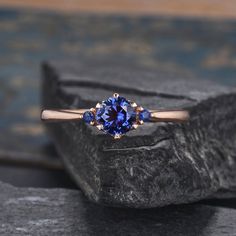 "Rose Gold Sapphire Engagement Ring Natural Sapphire Ring September Birthstone Three Stone 3 Stones Ring Dainty Promise Gift For Woman Same design with different gemstone: https://www.etsy.com/listing/550928284/three-stone-morganite-engagement-ring?ref=shop_home_active_110&frs=1 https://www.etsy.com/listing/550398230/aquamarine-engagement-ring-3-stone-ring?ref=shop_home_active_20&frs=1 https://www.etsy.com/listing/651133691/moissanite-engagement-ring-white-gold?ref=shop_home_active_116&a Fine Jewelry Tanzanite Three Stone, Anniversary Three-stone Tanzanite Jewelry, Sapphire Birthstone Ring With Gemstone Accents For Promise, Promise Ring With Sapphire And Gemstone Accents, Three Stone Round Tanzanite Jewelry, Three-stone Round Tanzanite Jewelry, Tanzanite Three-stone Round Jewelry, Three Stone Tanzanite Round Ring, Three Stone Tanzanite Rings For Anniversary