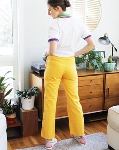 Bright yellow, super sunny cotton pant by Canterbury of New Zealand. Has draw string, pockets, and elastic waist. In great vintage condition, with standard wear, and only issue to note is a small spot by the left pocket (shown in last image). Labeled a size 30". Fits like a current, trim M or size 6/8. (*Please see specific dimensions below before buying.) Dimensions, taken flat and straight across, are: ▴ waist 13" (relaxed) to 18" (fully expanded) ▴ hip 23" ▴ rise 10" ▴ inseam 30.5" ▴ total le Casual Yellow Cotton Pants, Retro Cotton Pants With Relaxed Fit, Retro Wide Leg Cotton Pants, Retro Relaxed Fit Bottoms With Elastic Waistband, Retro Straight Pants Relaxed Fit, Relaxed Fit Retro Straight Pants, Retro Cotton Tapered Leg Pants, Retro Relaxed Fit Pants, Retro Relaxed Fit Straight Pants