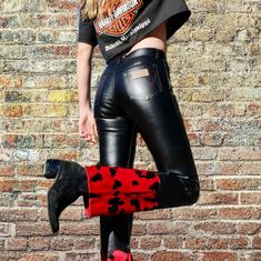 Look No Further Than These Rare Vintage Wrangler Black Faux Leather Pants With A Red Embroidered Design And Silver Rivets On The Upper Thighs. The Bottom Of The Pant Legs Are Adorned With A Unique Red And Black Velvet Cow Print. Waist: 30” Inseam: 30" #Wranglerpants #Blackfauxleather #Redembroidery #Silverrivets #Velvetcowprint #90sfashionrevival Western Style Fitted Full-length Jeans, Fitted Full-length Western Jeans, Fitted Full Length Western Jeans, Straight Leg Bottoms For Rodeo, Trendy Fitted Pants With Standard Cut Leg, Fitted Red Bottoms For Winter, Edgy Fitted Winter Jeans, Fitted Black Western Jeans, Mid-rise Bottoms For Fall Rodeo