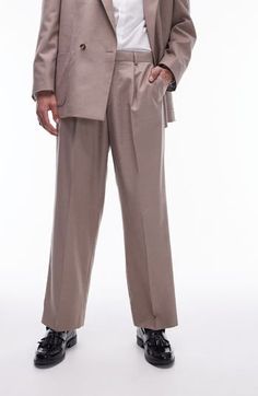 Crisp creases elevate stretch-kissed suit pants that are a sophisticated addition to any office wardrobe. 30 1/2" inseam; 20" leg opening; 12" front rise; 16 1/2" back rise (size 32) Zip fly with hook-and-bar closure Front slant pockets; back welt pockets 84% polyester, 14% viscose, 2% elastane Dry clean Imported Stretch Bottoms For Formal Spring Occasions, Elegant Flat Front Pants With Belt Loops, Spring Business Suits With Wide Leg, Spring Business Pantsuit With Wide Leg, Formal Stretch Wide Leg Dress Pants, Spring Business Wide Leg Suits, Full Length Office Wear Bottoms With Pockets, Fitted Pantsuit With Belt Loops For Business Casual, Spring Tailored Dress Pants For Office