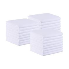 a stack of white towels sitting next to each other