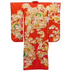 A visually striking antique Uchikake Wedding Kimono/Robe for ceremonial occasion, circa end of Meiji to Taisho period 1910s-1930s. This bridal outer garment is of a bright red color that features elaborate and intricate embroidery. Using brilliant colored and gold threads, the artisan decorated the kimono with the most auspicious symbols including flying phoenix, blooming peonies, fans, maple branches, and wisteria flowers. They form roundel motifs in a highly elaborate layout, especially striki Vintage Silk Kimono For Wedding, Vintage Long Kimono For Wedding, Ceremonial Vintage Kimono, Traditional Red Kimono For Wedding, Vintage Wedding Kimono With Kimono Sleeves, Vintage Red Kimono For Tea Ceremony, Vintage Red Kimono For Wedding, Traditional Embroidered Kimono For Tea Ceremony, Traditional Ceremonial Kimono For Festivals