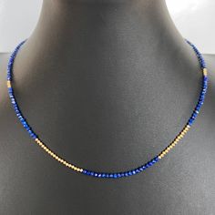 This faceted lapis lazuli and 14K gold bead strand necklace with a lobster clasp is delicate and perfect to add a touch of chic style. Wear alone for a classic look or layer it for your own unique fashion statement. Beaded necklace with faceted lapis lazuli gemstones 14K yellow gold beads + findings Lobster clasp closure shipping : allow up to a week from date your order was placed for shipping Gold Single Strand Lapis Lazuli Beaded Necklace, Elegant Gold Beaded Necklaces With Lapis Lazuli, Gold Lapis Lazuli Faceted Beads Necklace, Gold Lapis Lazuli Necklace With Faceted Beads, Elegant Lapis Lazuli Necklace With Faceted Beads, Elegant Lapis Lazuli Faceted Necklace, Gold Gemstone Necklace, Bead Strand, Strand Necklace