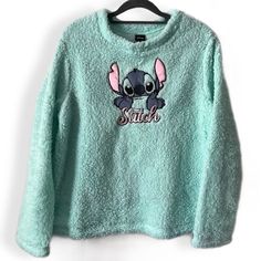 Disney Lilo & Stitch Mint Green Fuzzy Boucle Sherpa Fleece Sleep Top, Though It Doesn’t Look Like A Pajama Top! Like New Preowned Condition, No Tags, Never Worn. Boxy Fit, Very Soft. Smoke Free. Ship Same Or Next Business Day. Bundle To Save More $$ And Get Combined Shipping! New To Poshmark? Enter The Code Mypghcloset When You Sign Up And Receive $10 Off Your First Order! Cute Fleece Top For Loungewear, Disney Style Embroidered Long Sleeve Tops, Disney Embroidered Long Sleeve Tops, Fluffy Disney Sweater, Mickey Hoodie, Mickey Sweatshirt, Disney 50th Anniversary, Mickey Mouse Sweatshirt, Safari Print