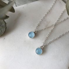 Please allow 10-15 days for production and delivery if item is not in stock. Our petite aquamarine necklace is a minimalist dream. Warm hand-textured metal melds perfectly with aqua, creating a timeless piece you can effortlessly stack with anything in your jewelry box. ✧ 14k gold-fill or sterling silver ✧ 16" chain with free 2" extender ✧ Aquamarine is the stone of courage and is the birthstone for March  ✧ Aqua may appear warmer in tone when set in gold vs silver ✧ Pendant measures 6mm Aquamarine Necklace Vintage, Gold Vs Silver, Aquamarine Necklace, Aquamarine Stone, Magpie, March Birth Stone, Stone Necklace, Cake Ideas, Stone Pendants