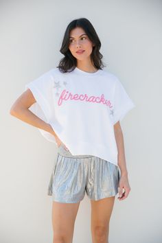 The "SHE'S A FIRECRACKER WHITE TEE" is perfect for any event. This oversized WHITE tee is perfect for everyday wear. Whether you're popping fireworks, by the pool, or just dreaming of summer, let everyone know that you're the life of the party. Match with your mini with the Mini Kid's Lil Firecracker tee! All orders are currently shipping within 14 business days. To receive item quicker, expedited shipping is available at checkout. White Sweatshirt For Summer Streetwear, Trendy White Sweatshirt For Summer, Trendy White Summer Sweatshirt, White Short Sleeve Sweatshirt For Spring, White Summer Sweatshirt For Loungewear, Life Of The Party, White Tee, Everyone Knows, The Pool