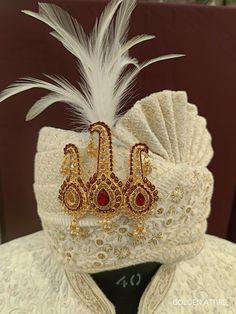 Elevate your groom's wedding ensemble with our exquisite Turban Brooch, a distinctive and intricate piece of Indian men's jewelry crafted to enhance safa pagdi, exuding regal charm. This brooch for groom is a remarkable blend of tradition and style, a statement safa jewelry that adds a touch of opulence to your wedding accessories. Meticulously designed, our groom wedding accessories reflect the rich heritage of Indian culture, making them an essential addition to your collection of men's brooch Groom Turban, Men's Brooch, Groom Accessories, Turbans, Wedding Groom, Hair Accessories Headbands, Wedding Accessories, Jewelry Crafts, Special Day