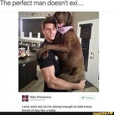 a man holding a dog in his arms and the caption says, the perfect man doesn't exi