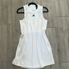 Nwot Adidas White Dress. Super Cool White Adidas Dress. Can Be Cinched At The Waist And Has Pockets. Size Small. Also Available In Black In My Closet. Make An Offer Of Bundle For A Discount!! Adidas Sporty Summer Dresses, Sporty Adidas Summer Dresses, White Fitted Athletic Dress, Sporty Spring Dresses For Daywear, Adidas Mini Dress For Spring, White Tennis Dress For Spring Daywear, White Spring Tennis Dress For Daywear, White Fitted Tennis Dress For Daywear, White Sleeveless Tennis Dress For Spring