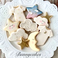 some cookies that are on a plate with the words bunnies written in white and gold