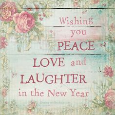 a wooden sign that says wishing you peace and love and laughter in the new year