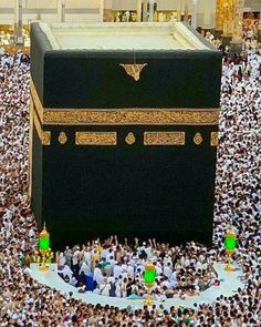 an aerial view of the ka'bah in the middle of a large crowd