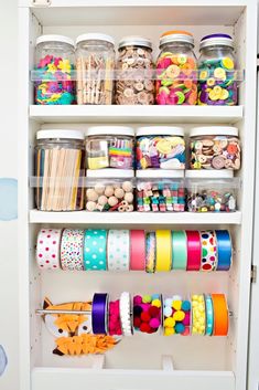 the shelves are filled with different types of washi tapes and other crafting supplies