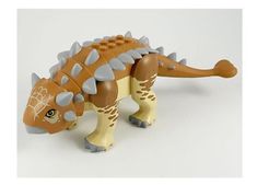 a toy dinosaur with spikes on its back