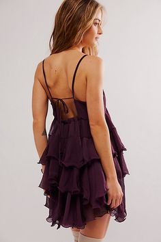 Tiered ruffles make this mini slip from Intimately the perfect romantic addition to your wardrobe. **Fit:** A-line, empire waistline, mini length **Features:** Babydoll style, tiered ruffles, scoop neckline, skinny straps with adjustable tie back **Why We | Runaway Rockstar Mini Slip by Intimately at Free People in Purple, Size: S Christmas Mini Dress, Free People Aesthetic, Mini Slip, Babydoll Style, Empire Waistline, Free People Dress, Scoop Neckline, Dream Clothes, Homecoming Dresses