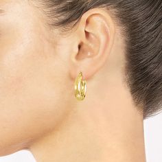 These 14K gold over brass hoop earrings add a simple and bold statement to any jewelry collection. Hoop earrings are crafted in 14K gold over brass, 25.6mm in length and have a hinged closure. With the simple hoop design, these hoop earrings will become a staple in your jewelry collection. With the simple and sleek design, these hoop earrings can be worn with your everyday wardrobe choices. Wipe hoop earrings clean with a soft cloth.Included: 1 Pair of EarringsFeatures: Nickel FreeEarring Back: Modern Gold Huggie Wrap Earrings, Modern Gold Huggie Earrings With Lever Back, Brass Hoop Earrings, Hoop Design, Brass Hoops, Earrings Hoop, Everyday Wardrobe, Sleek Design, Diamond Earrings