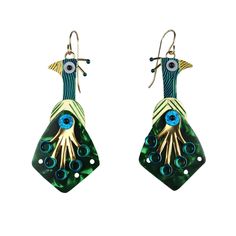 Brass Earrings - This dazzling pair of peacock earrings is sure to grab attention wherever you go! Handmade in richly-textured brass accented in painted blues and greens, each sports an altered celluloid guitar pick as a tail, designed with a prismatic rivet so they swing freely. Multi layered and very decorative, these beautiful birds will delight all year long. Finished with gold-filled ear wires. Bohemian Metal Jewelry With Peacock Design, Elegant Blue Peacock Design Earrings, Elegant Peacock Design Dangle Earrings, Elegant Multicolor Peacock Design Earrings, Elegant Peacock-colored Earrings As A Gift, Peacock Earrings, Brass Accents, Guitar Pick, Brass Earrings