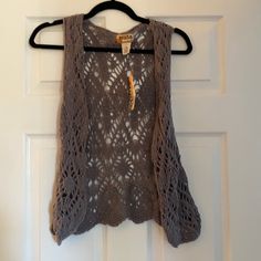 Grey Cute Vest Sleeveless Crochet Lace Top For Fall, Casual Winter Crochet Lace Top, Casual Crochet Lace Top For Winter, Casual Winter Crochet Top With Crochet Trim, Casual Open Knit One-size Crochet Top, Casual One Size Open Knit Crochet Top, Casual One Size Crochet Top, Casual Knit Crochet Top For Festivals, Casual Open Knit Crochet Top For Festivals