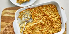 a casserole dish with cheese and bread crumbs