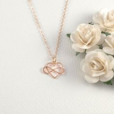 "A Beautiful heart and infinity necklace. This is available in 4 finishes: Sterling silver charm and chain Sterling silver heart/bronze infinity charm and sterling silver chain Gold plated (over sterling) with gold-filled chain Rose Gold plated (over sterling) with rose gold-filled chain. This comes with a 16\" 18\" or 20\" Flat cable chain. Please convo me for a quote on a longer chain. Your choice of card for the box. The card shown in the 1st photo is the \"Thank you, Mom for your infinite lo Gold Open Heart Necklace Nickel Free, Gold Open Heart Nickel-free Necklace, Gold Open Heart Necklace Nickel-free, Nickel Free Gold Open Heart Necklace, Dainty Rose Gold Infinity Necklace, Dainty Infinity Rose Gold Necklace, Rose Gold Necklace Gift For Mom, Rose Gold Charm Necklace For Mom, Gold Double Heart Necklace Nickel Free