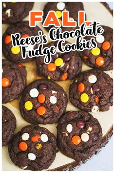 chocolate cookies with candy on top and the words fall reese's chocolate fudge cookies