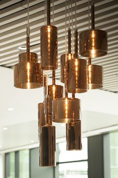 Hanging copper lights. Taylor Wimpey, Sky Bridge, Luxury Office, Plush Carpet, Soft Carpet, Reception Areas