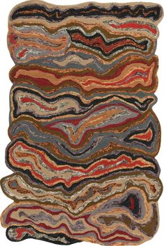 a multicolored area rug with wavy lines on the top and bottom of it