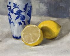 a painting of two lemons and a blue and white vase