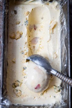 two scoops of ice cream in a metal pan