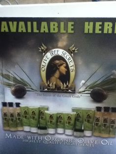 an advertisement for olive tree herbs on display